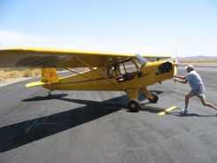 Brian props the Cub for a fast get away from Needles Brian props the Cub for a fast get away from Needles