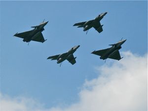 Dassault Rafales and Dassault Super Etendards fly over Dassault Rafales and Dassault Super Etendards fly over