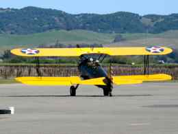 Stearman taxis through vineyards