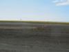 Can you see the end of this lava runway?  Small red cones on the lava mark it.