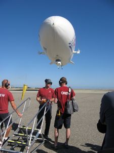 Zeppelin coming in for a landing - Crew chief hold the wind sock... 